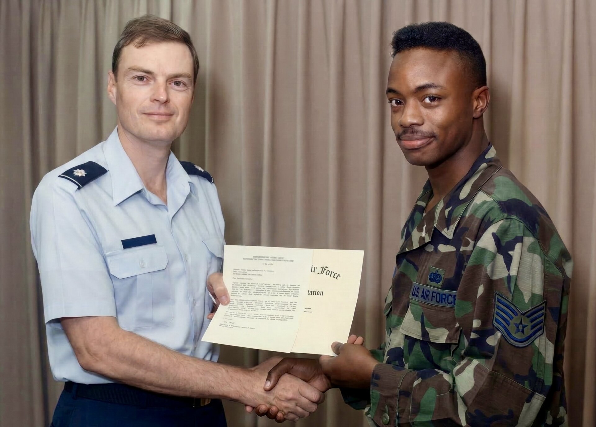 Frederick Van Johnson receiving the Air Force Commendation Medal