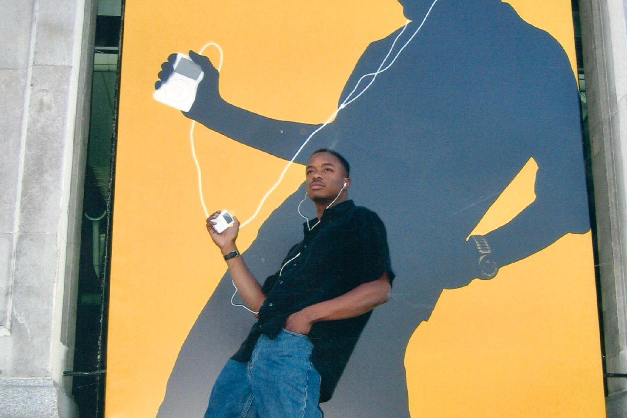 Frederick Van Johnson at iTunes Music Store UK launch London with iPod silhouette ads Apple